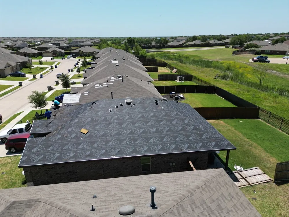 Slide of Taylored Roofing