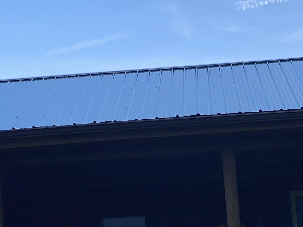 Slide of Taylormade Gutters and Metal Roofing
