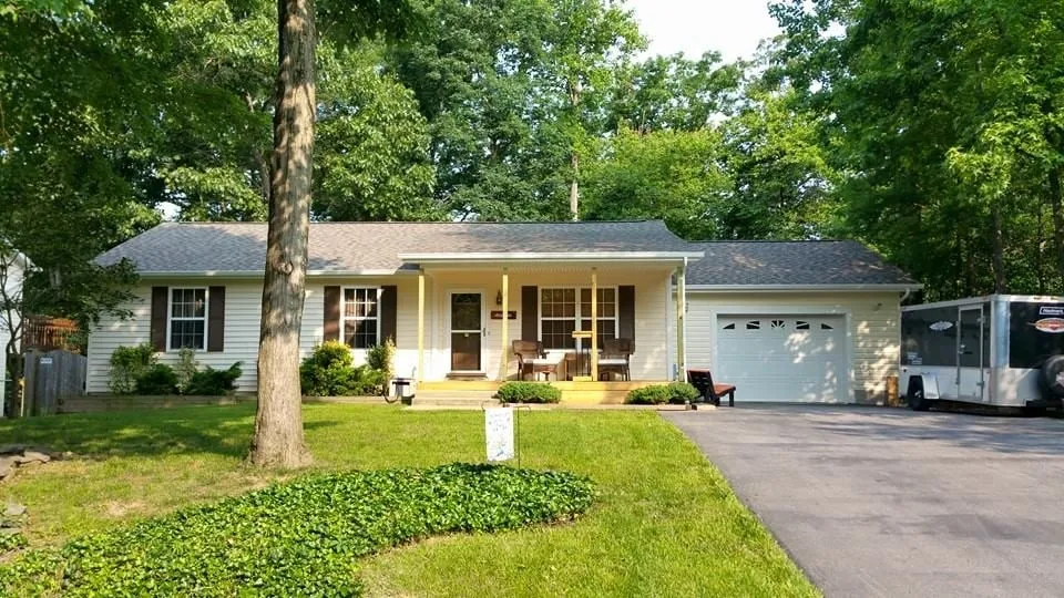Local storm damage roof repair after storm damage in Faulkner, MD by Tayman Roofing & Siding