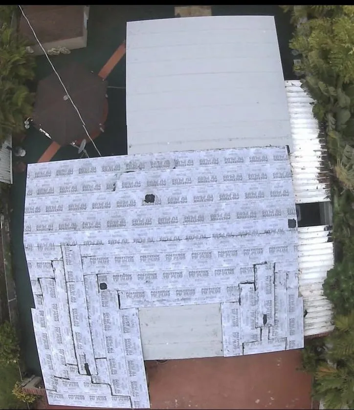 Slide of TBI Roofing