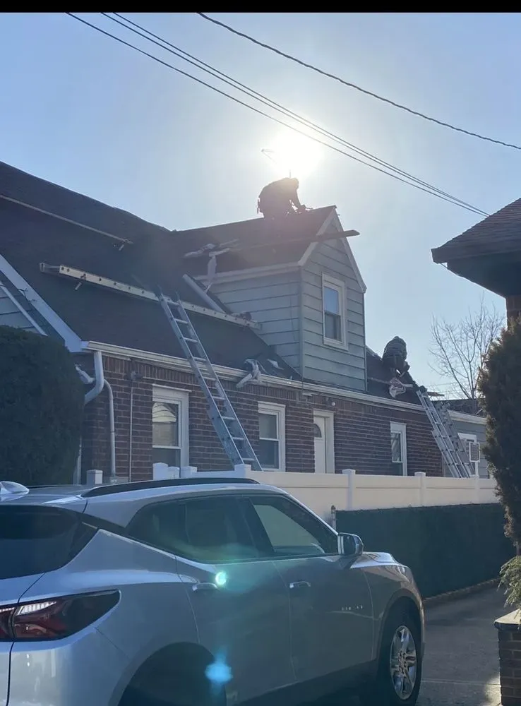 Slide of T&C Roofing