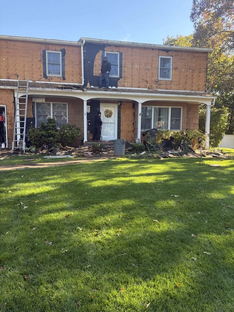 Slide of T&C Roofing