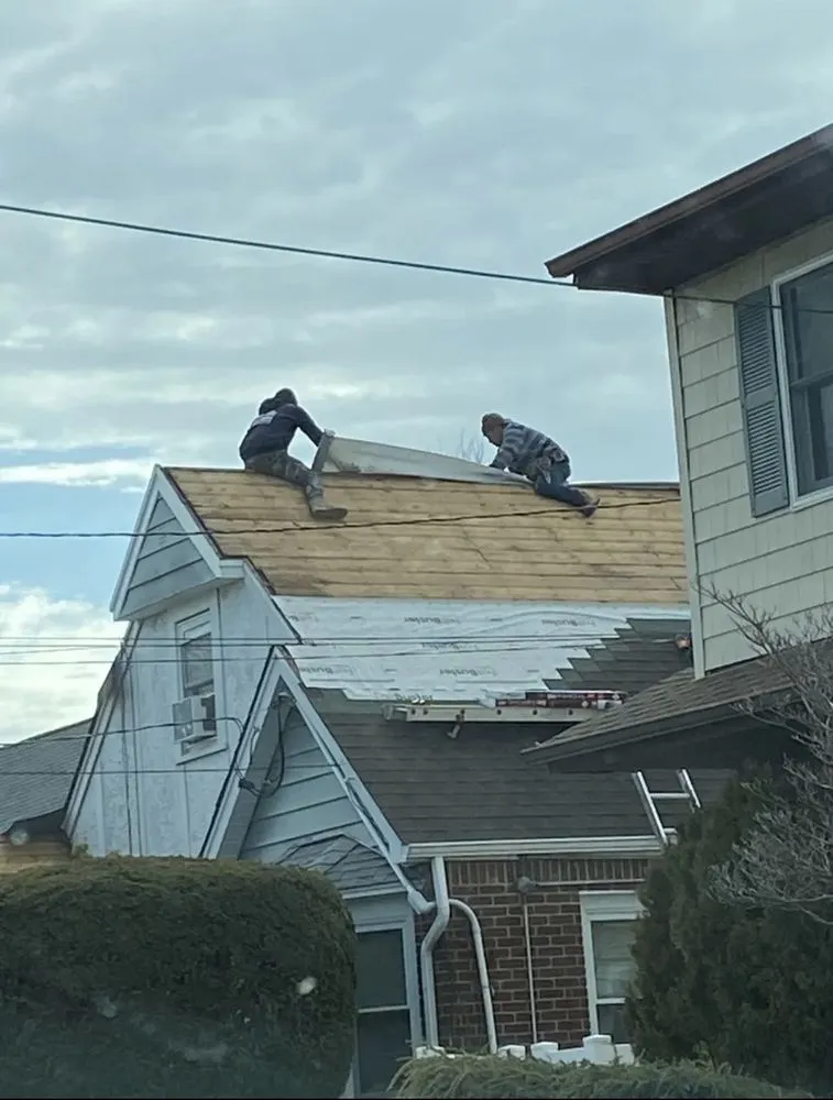 Slide of T&C Roofing