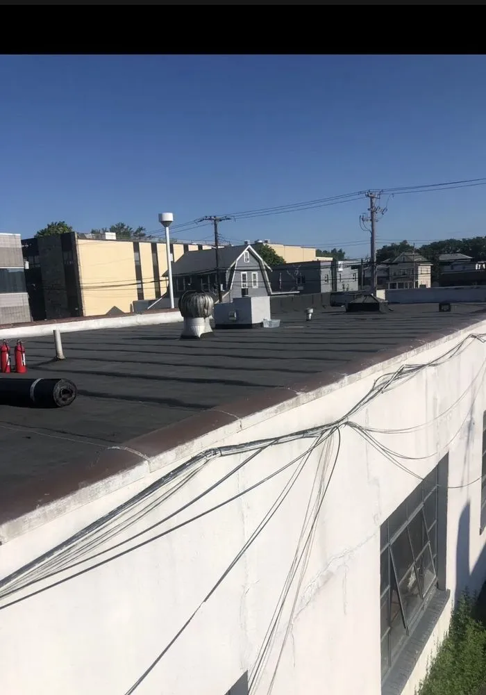 Slide of T&C Roofing