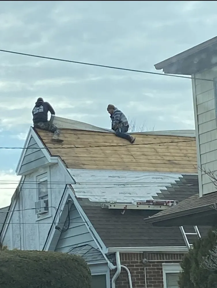 Slide of T&C Roofing