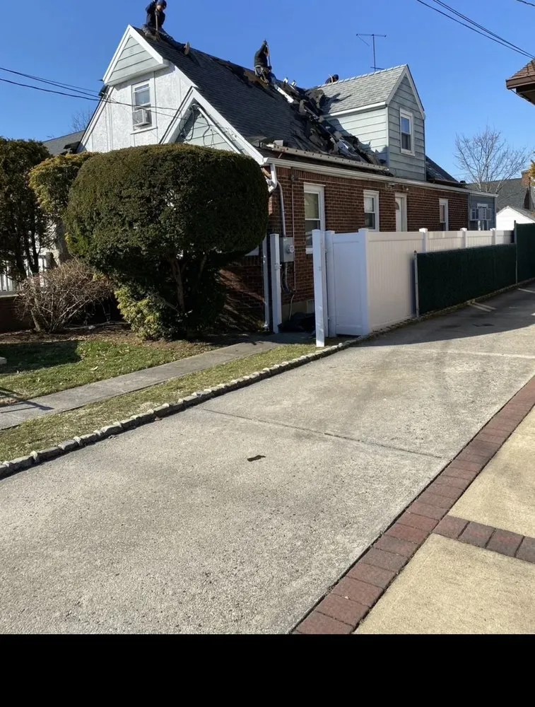 Slide of T&C Roofing