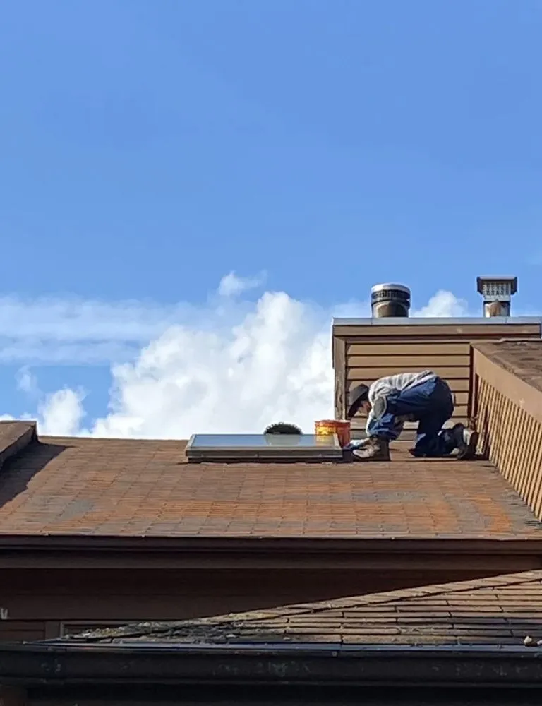 Slide of T&C Roofing