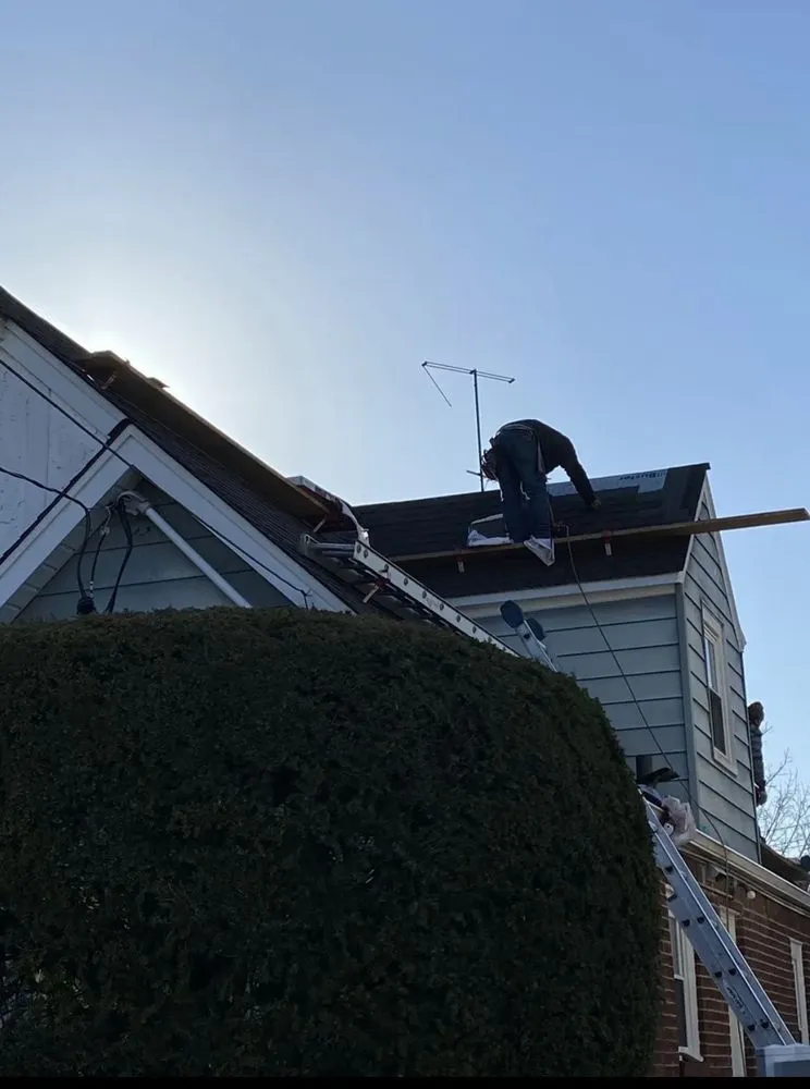 Slide of T&C Roofing