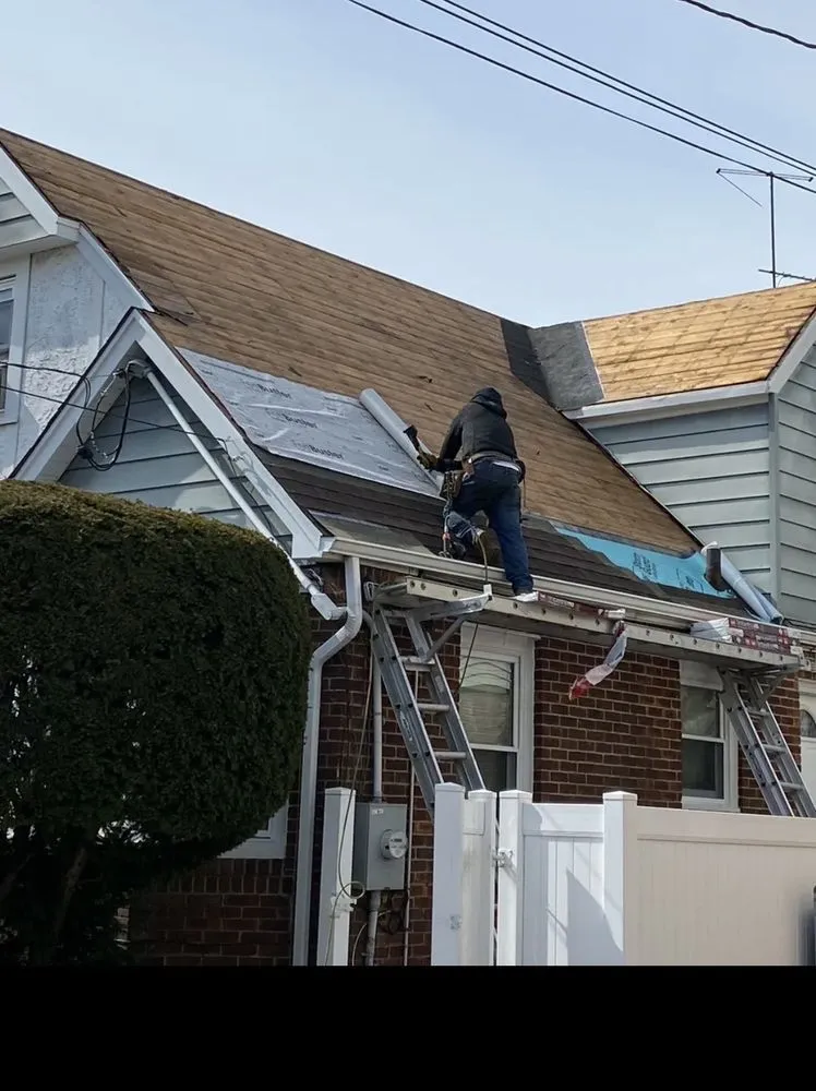 Slide of T&C Roofing