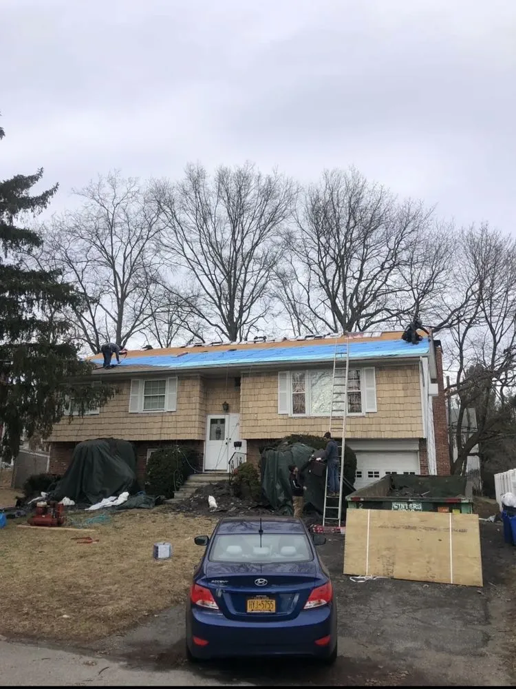 Slide of T&C Roofing