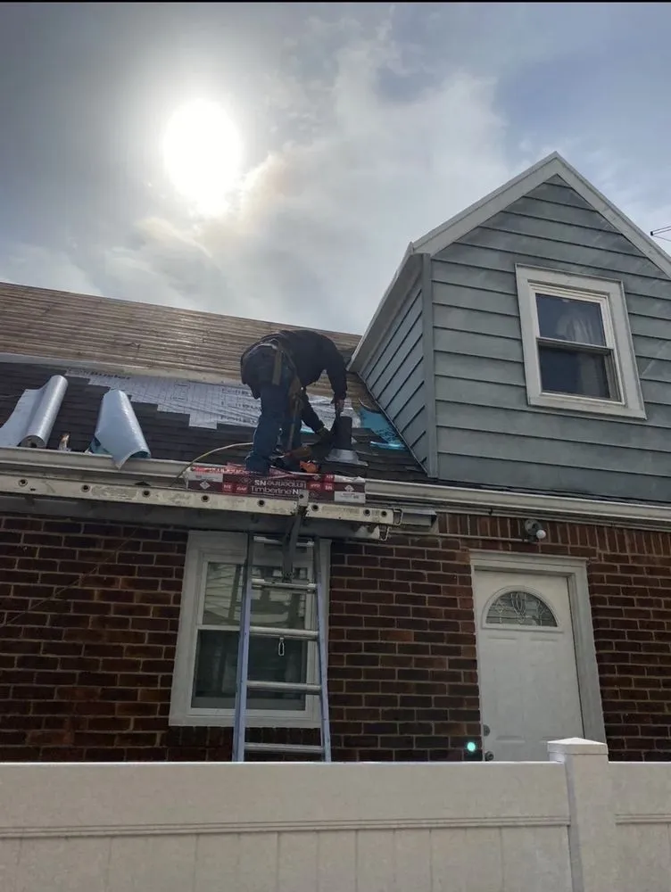 Slide of T&C Roofing