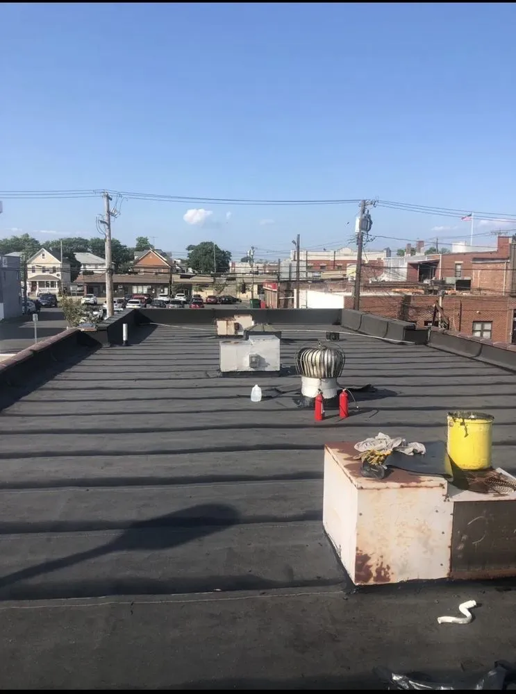 Slide of T&C Roofing