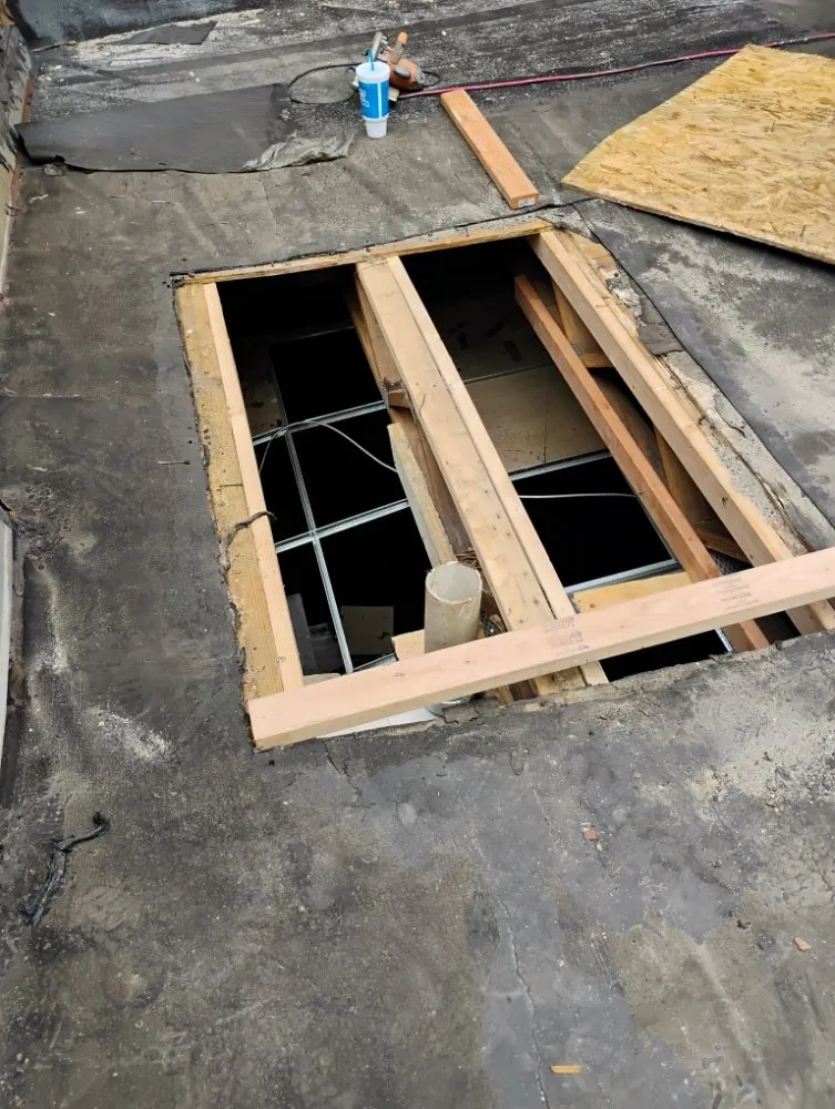 Slide of TCB Roofing