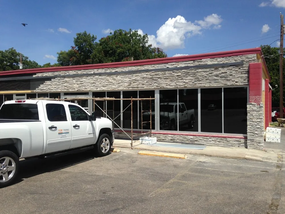 Slide of TCR - Thomas Contracting & Roofing