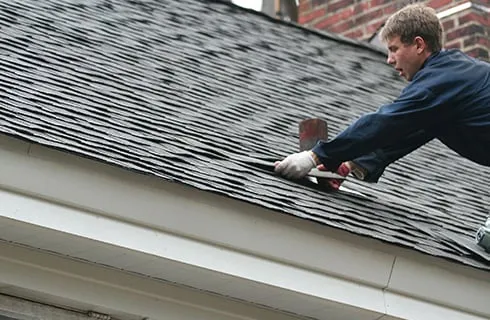 Slide of T&E Roofing