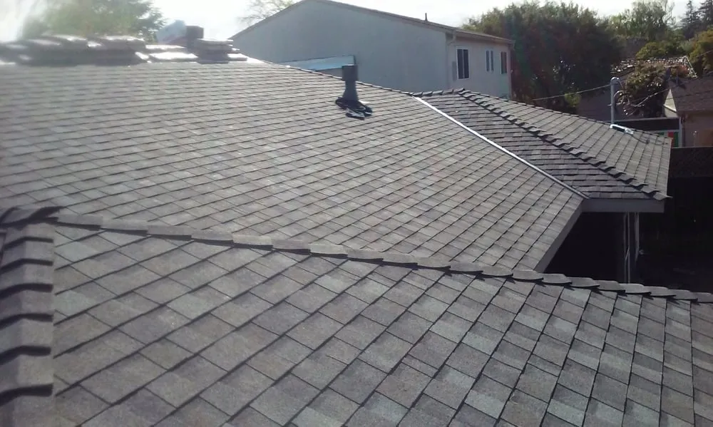 Slide of Teal City Roofing