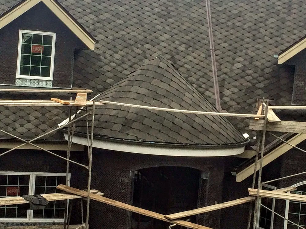 Slide of Teal City Roofing