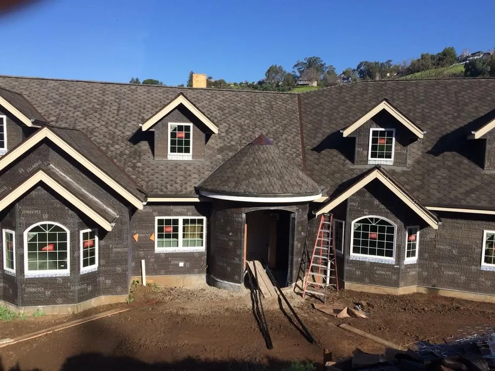 Slide of Teal City Roofing