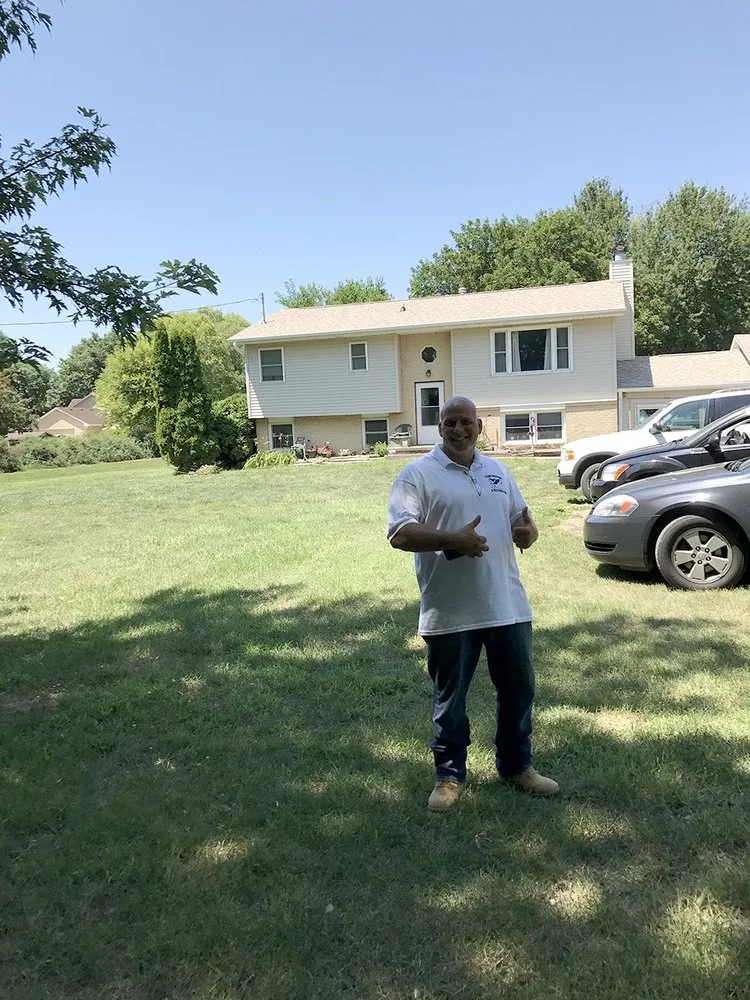 Licensed roof replacement after storm damage in Eddyville, IA by Team Roofing & Restoration