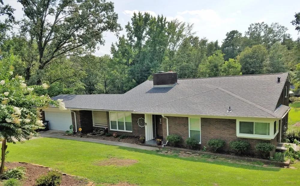 Slide of Team Roofing and Construction