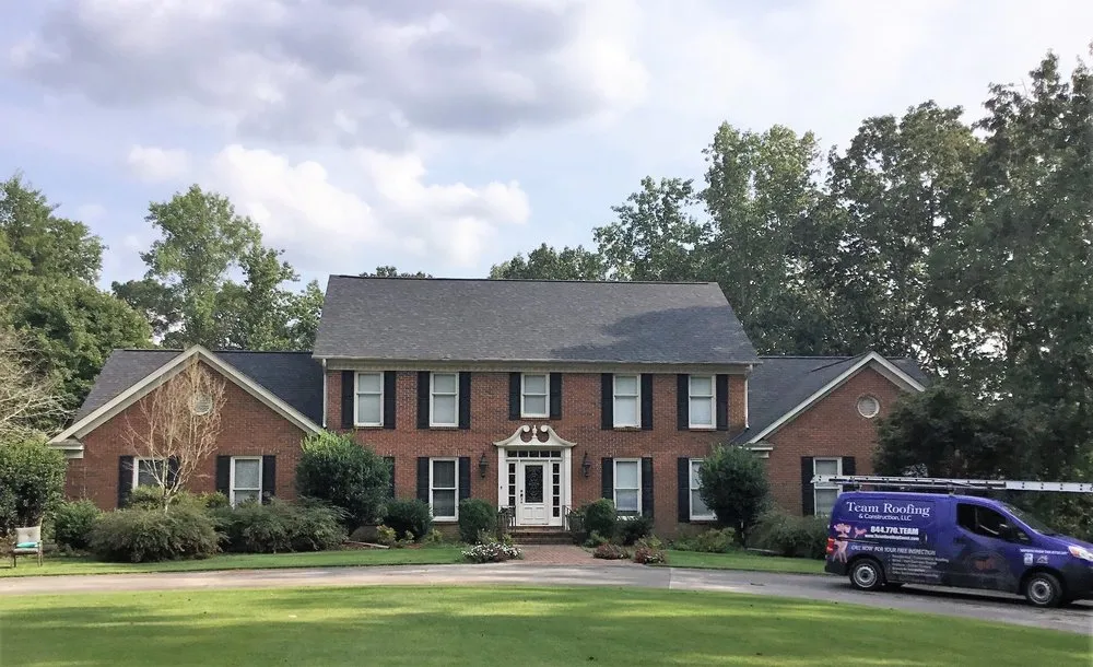 Slide of Team Roofing and Construction
