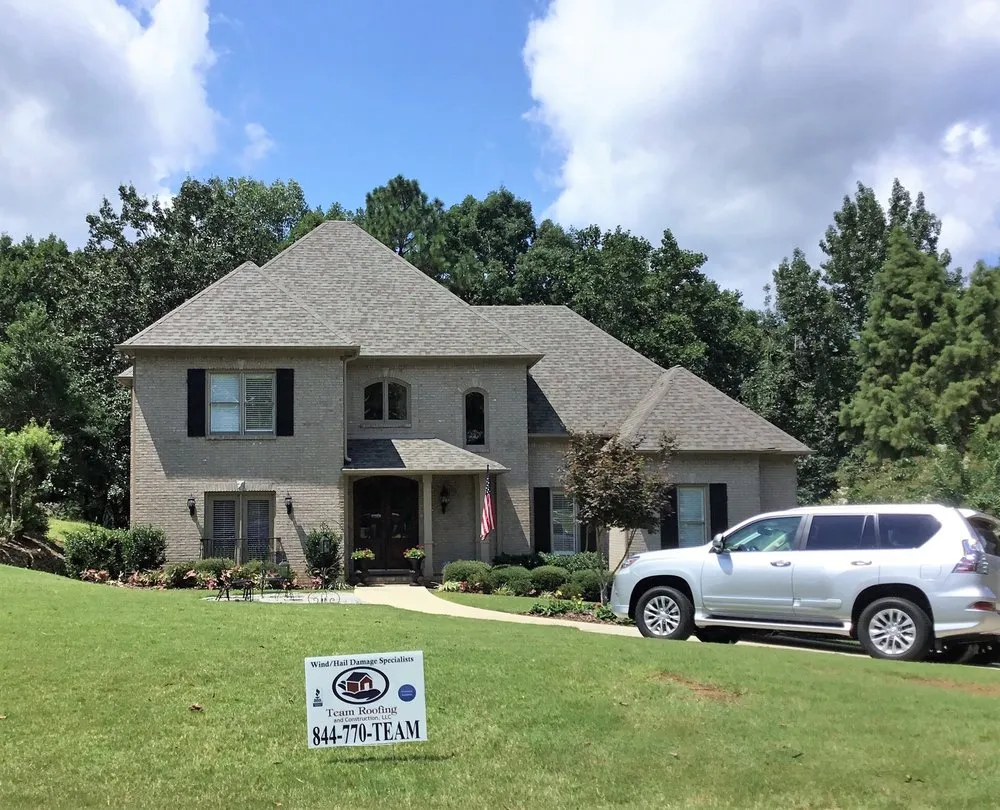 Slide of Team Roofing and Construction