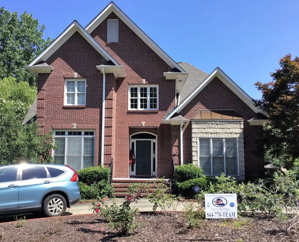 Slide of Team Roofing and Construction