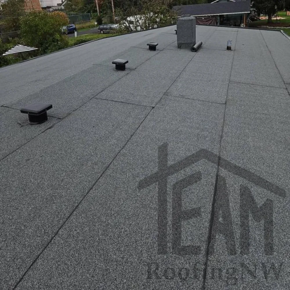 Slide of Team Roofing Northwest