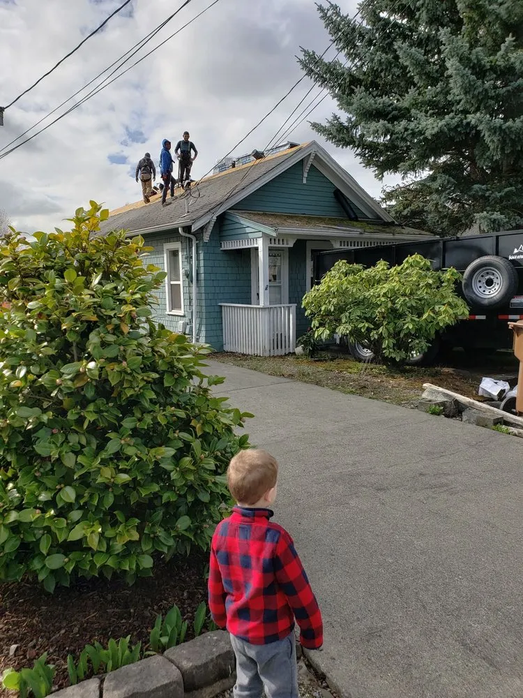 Slide of Team Roofing Northwest