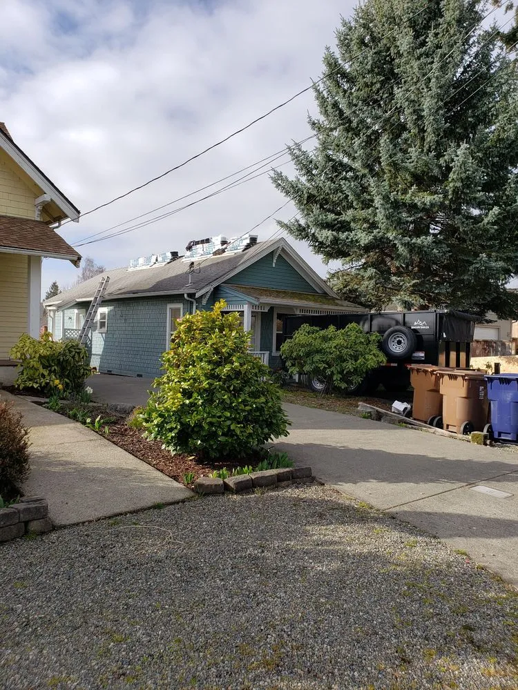 Slide of Team Roofing Northwest