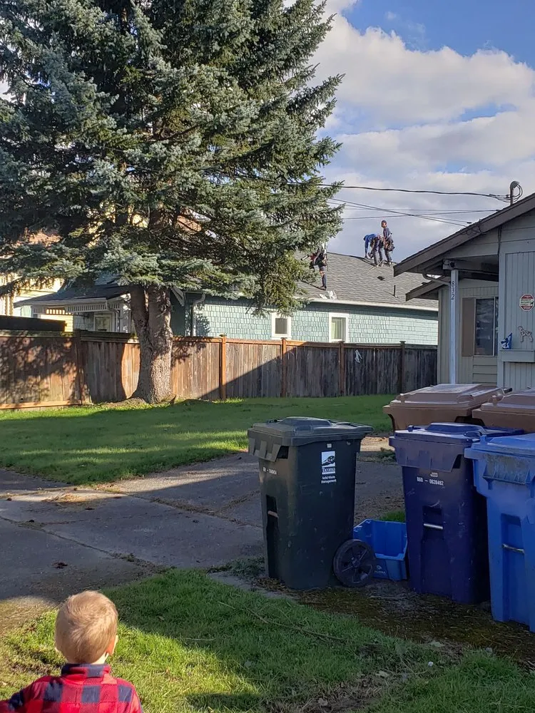 Slide of Team Roofing Northwest