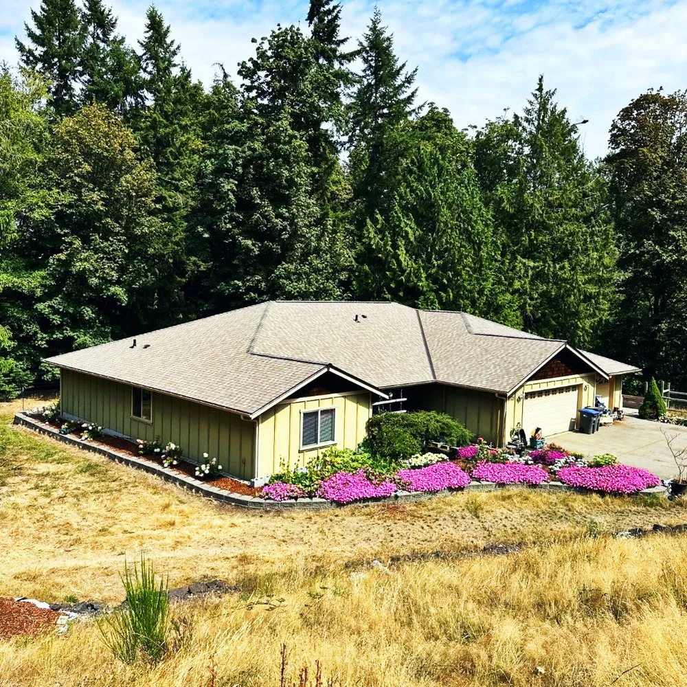 Slide of Team Roofing Northwest