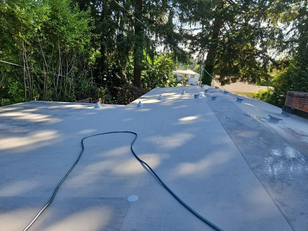 Slide of Team Roofing Northwest