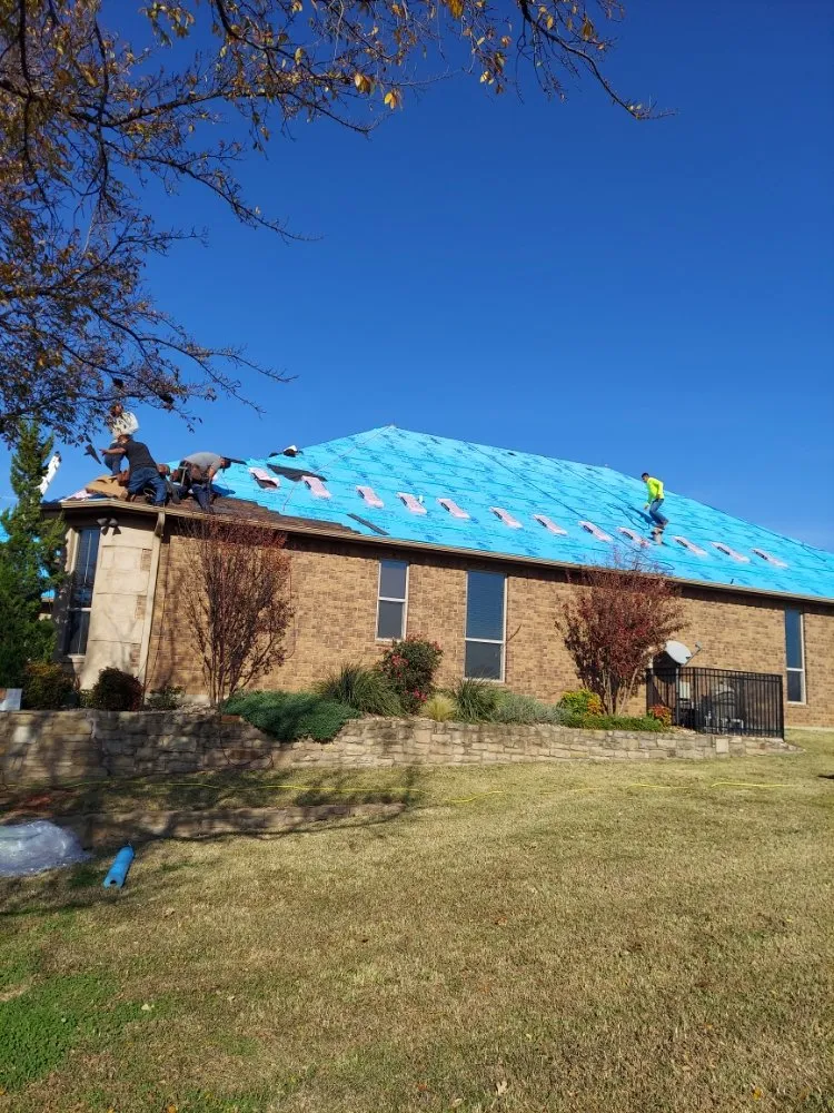 Emergency residential roofing service with free inspection in Gordonville, TX by Team Texas Construction
