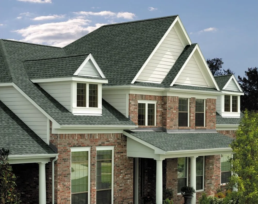 Slide of Team Work Roofing