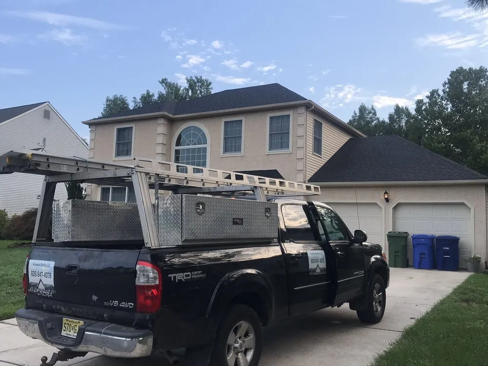 Slide of Team Work Roofing