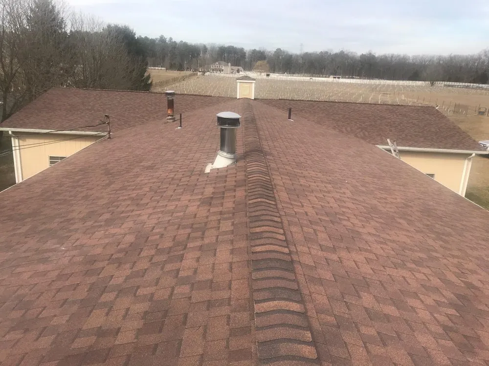 Slide of Team Work Roofing