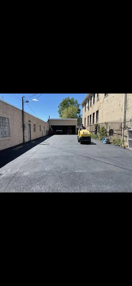 Slide of Tech Roofing and paving