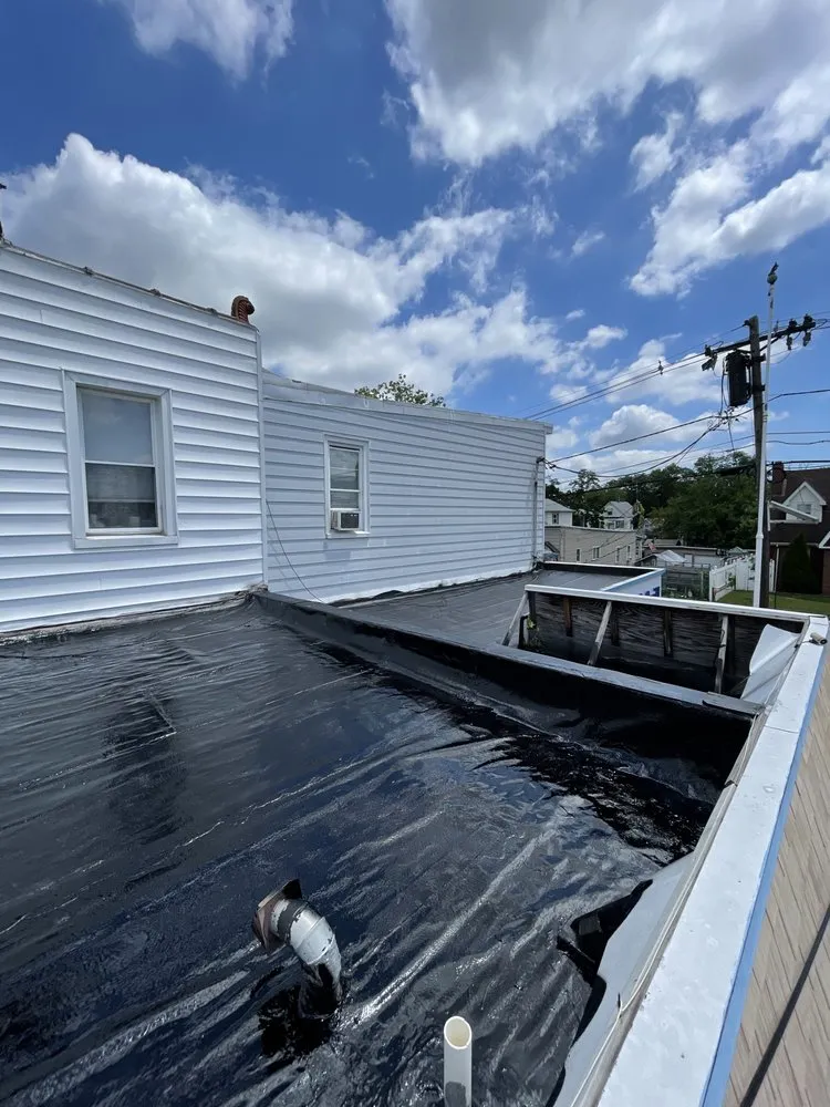 Slide of Tech Roofing and paving