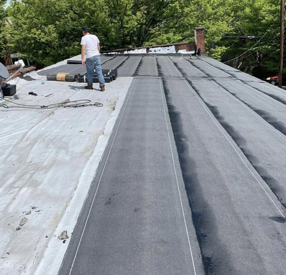 Slide of Tech Roofing and paving