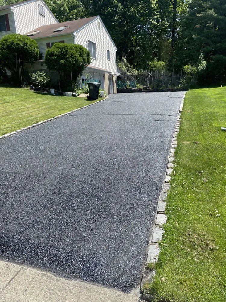 Slide of Tech Roofing and paving