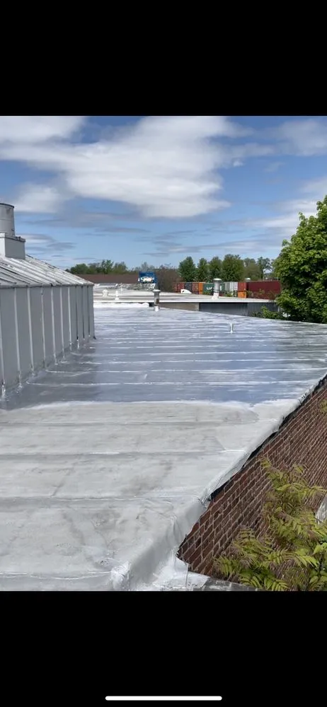 Slide of Tech Roofing and paving