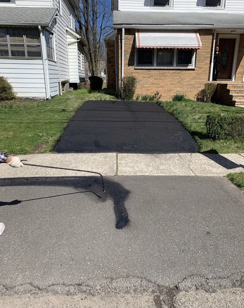 Slide of Tech Roofing and paving