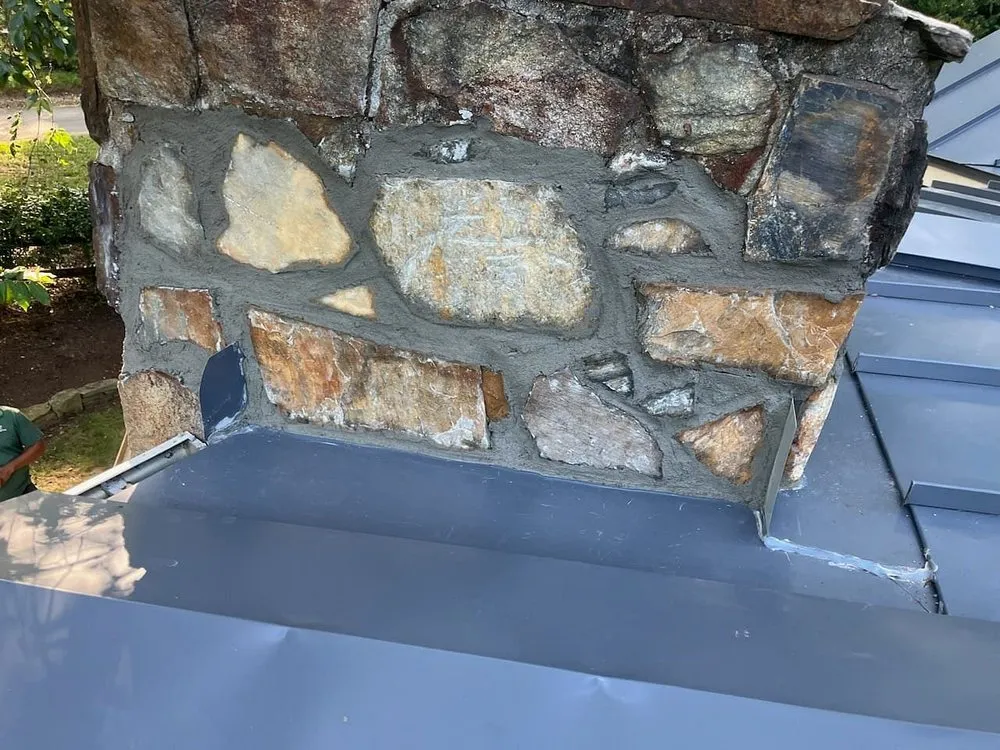 Slide of Tectum Roofing & Construction