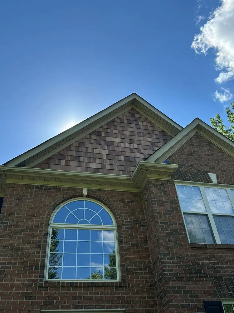 Slide of Tectum Roofing & Construction