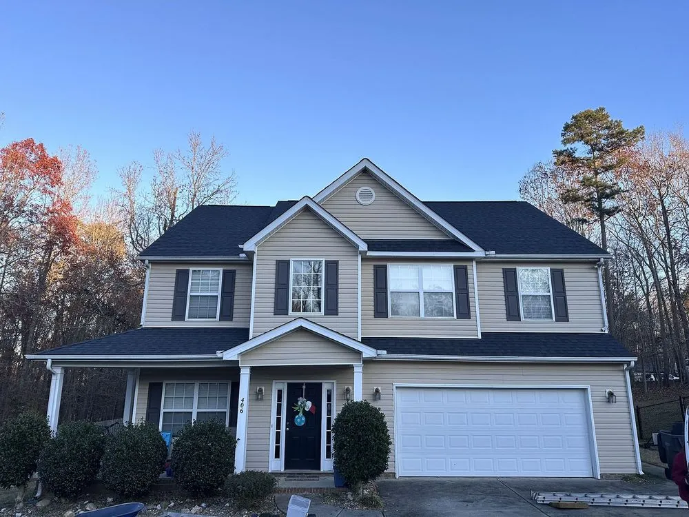 Slide of Tectum Roofing & Construction