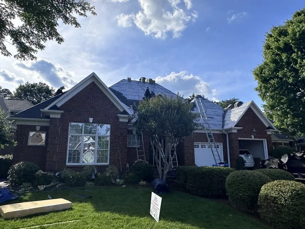 Slide of Tectum Roofing & Construction