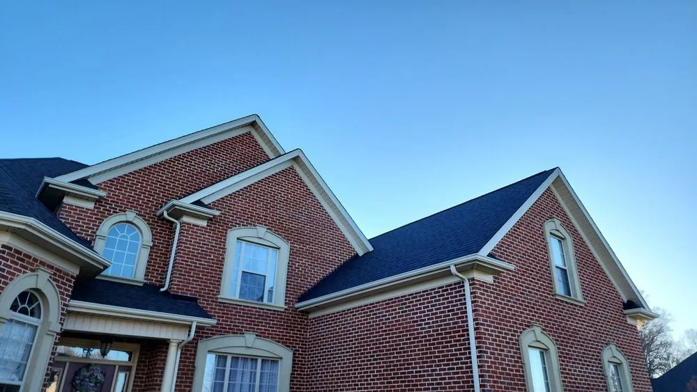 Slide of Tectum Roofing & Construction