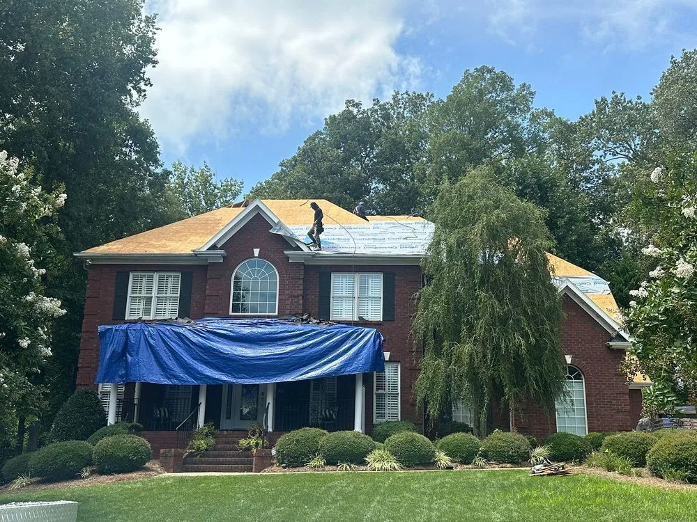 Slide of Tectum Roofing & Construction