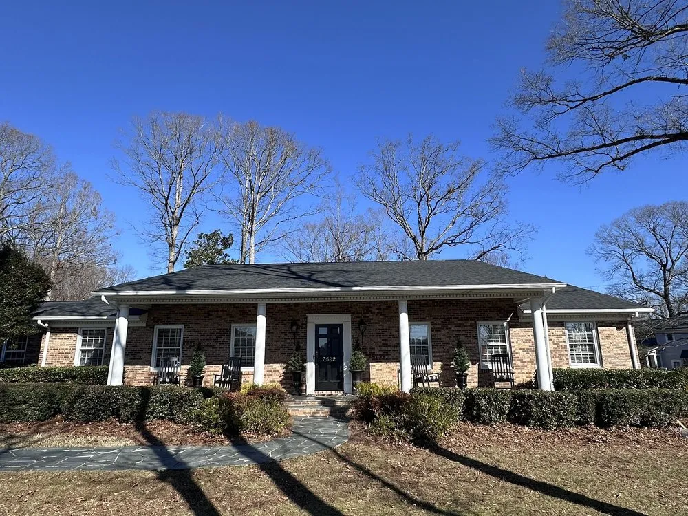 Slide of Tectum Roofing & Construction